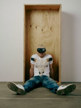 ski aggu wearing freedoms bull shirt, in a box